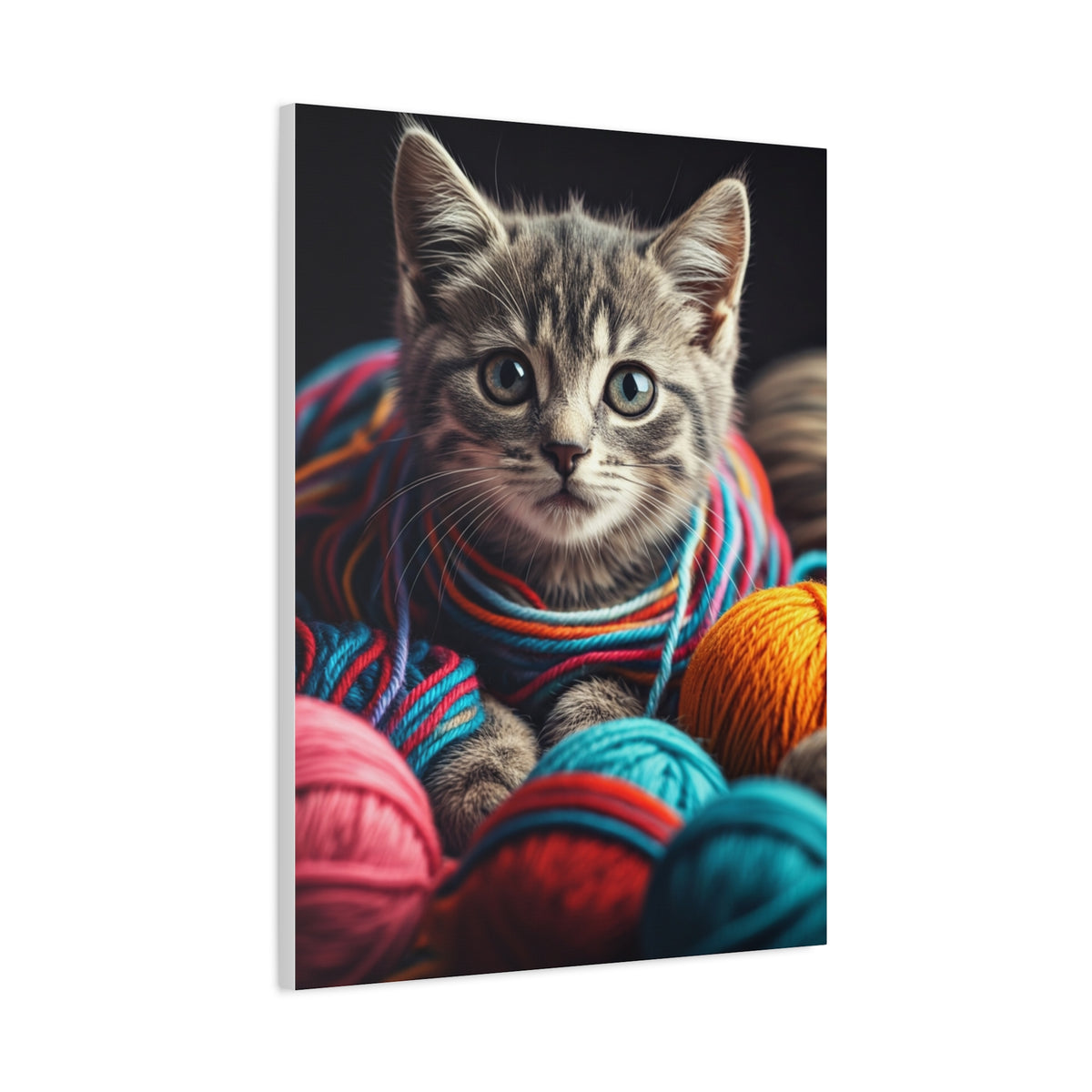 Kitten in Colorful Yarn Wall Art & Canvas Prints