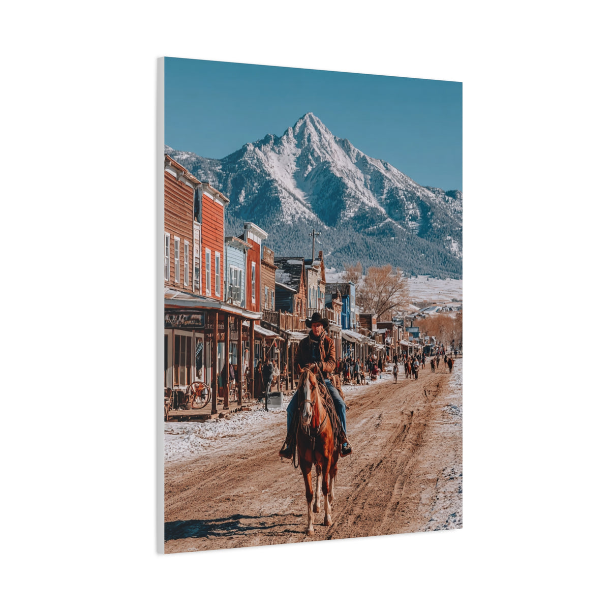 Cowboy Riding Through a Frontier Mountain Town Wall Art & Canvas Print