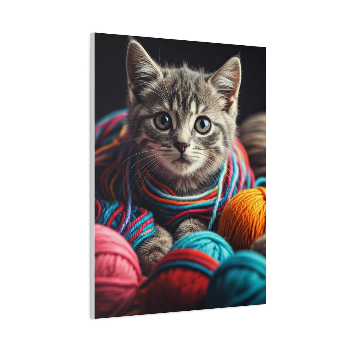 Kitten in Colorful Yarn Wall Art & Canvas Prints