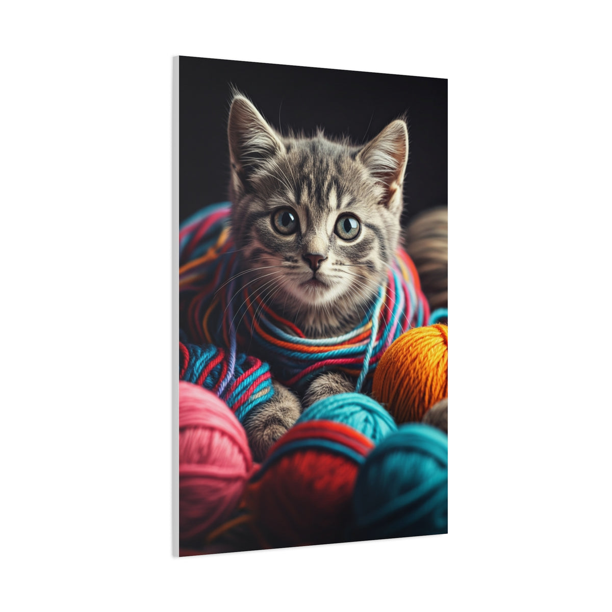 Kitten in Colorful Yarn Wall Art & Canvas Prints